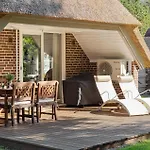 Three-bedroom In Hébergement de vacances